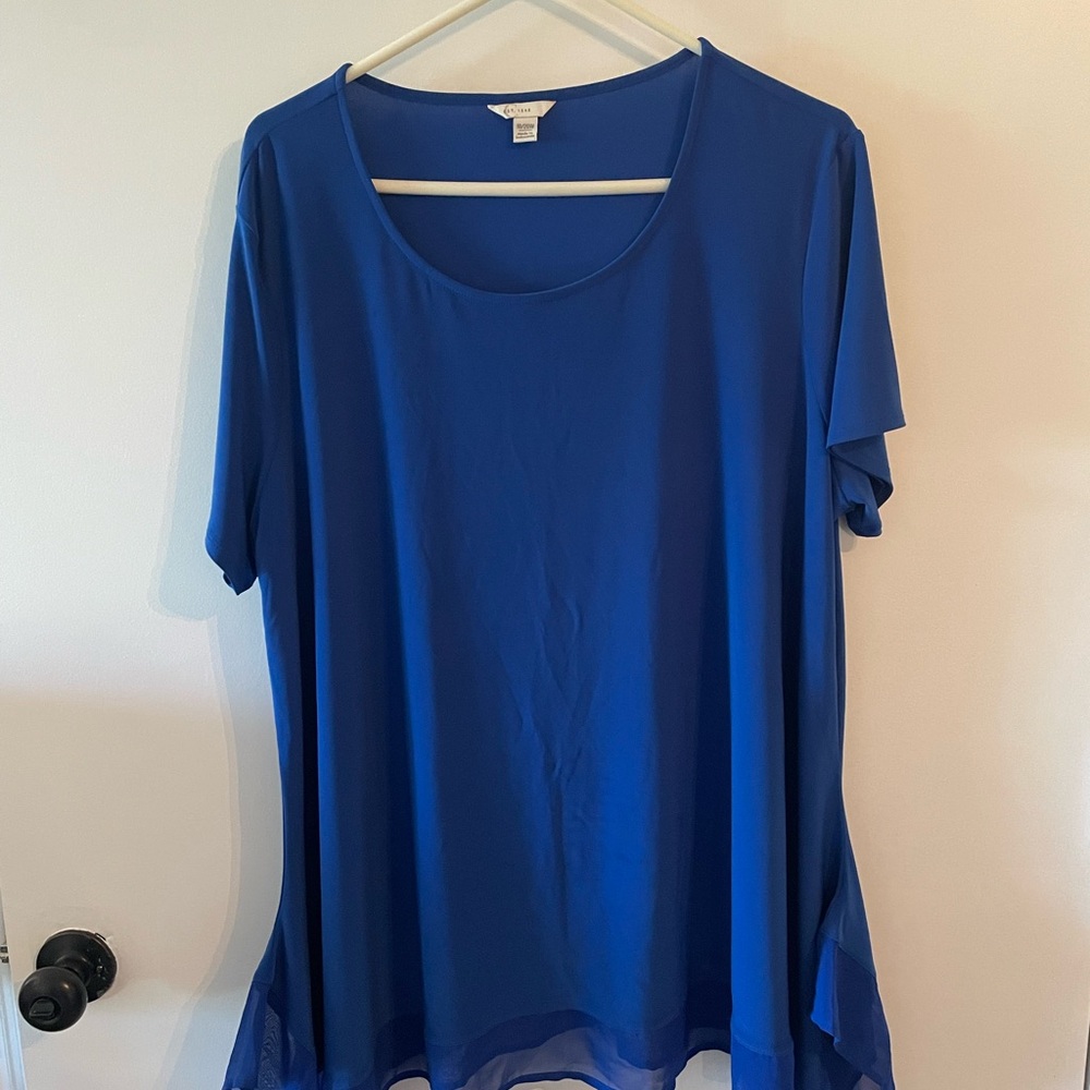 Navy blouse made of polyester blend.